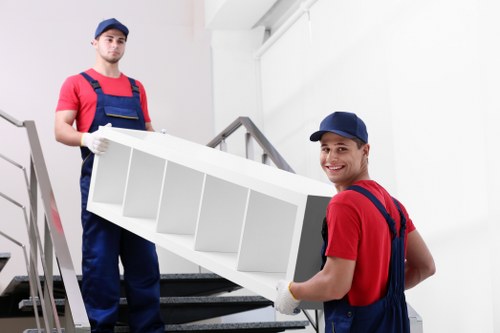 Specialist team transporting a piano safely in Waterloo